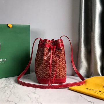 PETIT FLOT BUCKET BAG 22 IN CLASSIC RED GOYARDINE CANVAS AND LAMBSKIN TRIM Luxe Carry