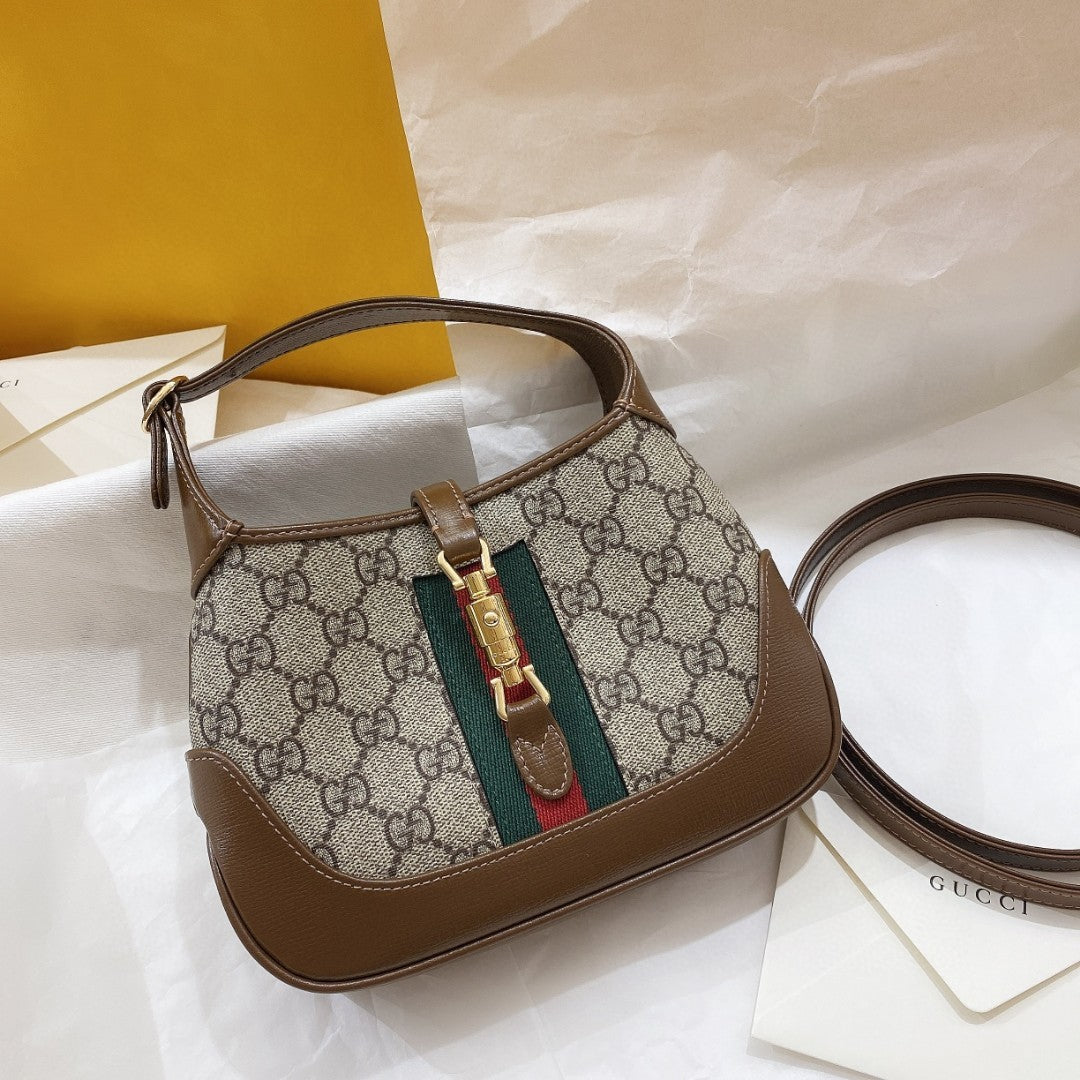 JACKIE 1961 SMALL 28 SHOULDER BAG IN BEIGE CANVAS AND BROWN CALFSKIN Luxe Carry