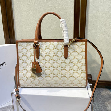 CELINE 25S HORIZONTAL CABAS 34MM IN WHITE TRIOMPHE CANVAS AND BROWN CALFSKIN Luxe Carry