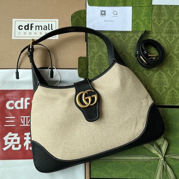 MEDIUM APHRODITE 39 BAG IN BEIGE CANVAS AND BLACK CALFSKIN GOLD HARDWARE by Luxe Carry