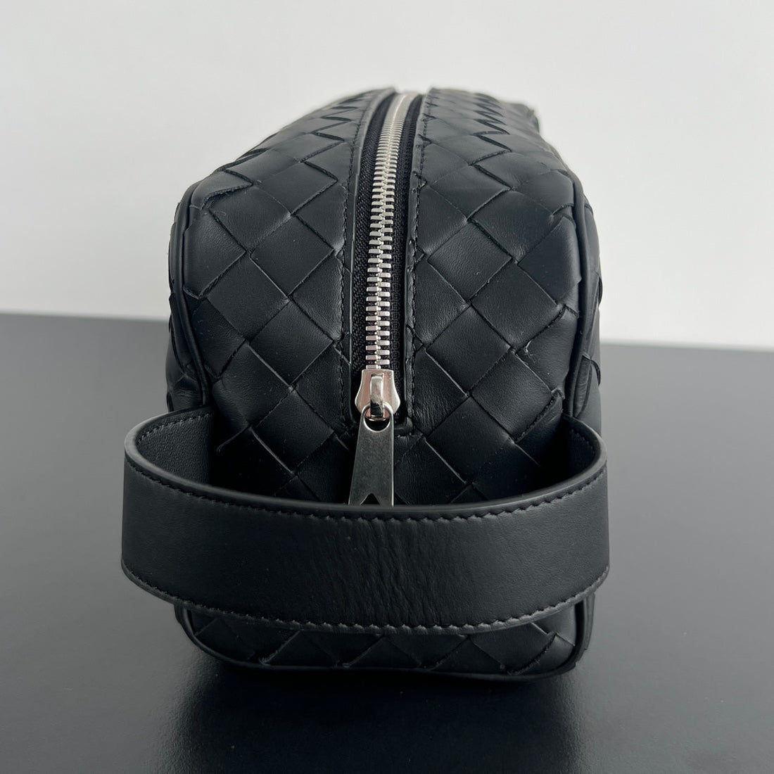 INTRECCIATO CLUTCH 26 IN BLACK CALFSKIN Luxe Carry Bags