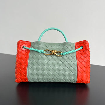 EAST WEST ANDIAMO BAG 29 IN ORANGE AND LIGHT GREEN CALFSKIN by Luxe Carry