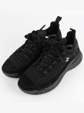Mixed fiber black quilted gold sneakers 39 260 Chanel