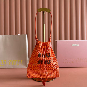 MIUMIU 26S WANDER BUCKET BAG 23 IN ORANGE RAFFIA WITH LEATHER TRIM Luxe Carry