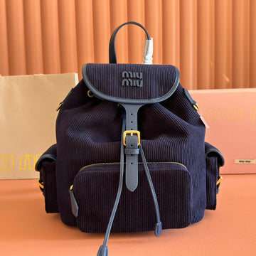 MIUMIU 26S MEDIUM BACKPACK 29 IN DARK BLUE CANVAS BLUE CALFSKIN Luxe Carry