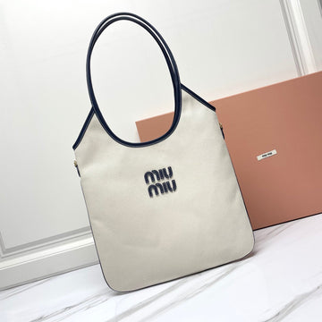 IVY TOTE BAG 40 IN WHITE CANVAS AND NAVY LEATHER TRIM By Luxe Carry